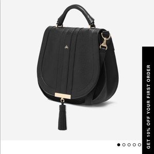 Demellier Midi Venice as worn by Meghan Markle